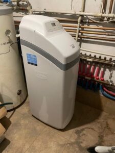 EcoWater water softener installed in a utility room, a MICHLOR project