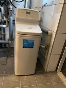 EcoWater water softener installed in a utility room, a MICHLOR project