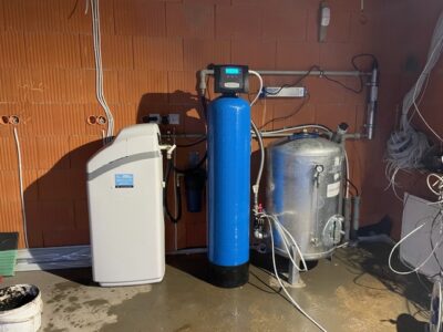 Graphite EcoWater water softener installed on a domestic water system