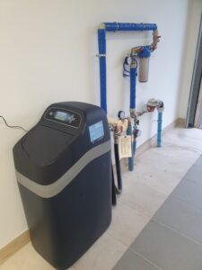 Graphite EcoWater water softener installed on a domestic water system
