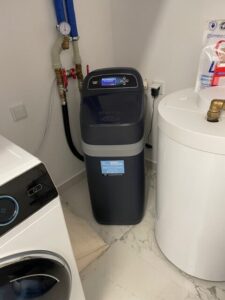 EcoWater water softener installed in a utility room, a MICHLOR project