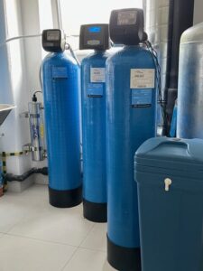 EcoWater softener connected to a system with a pressure vessel, installed by MICHLOR